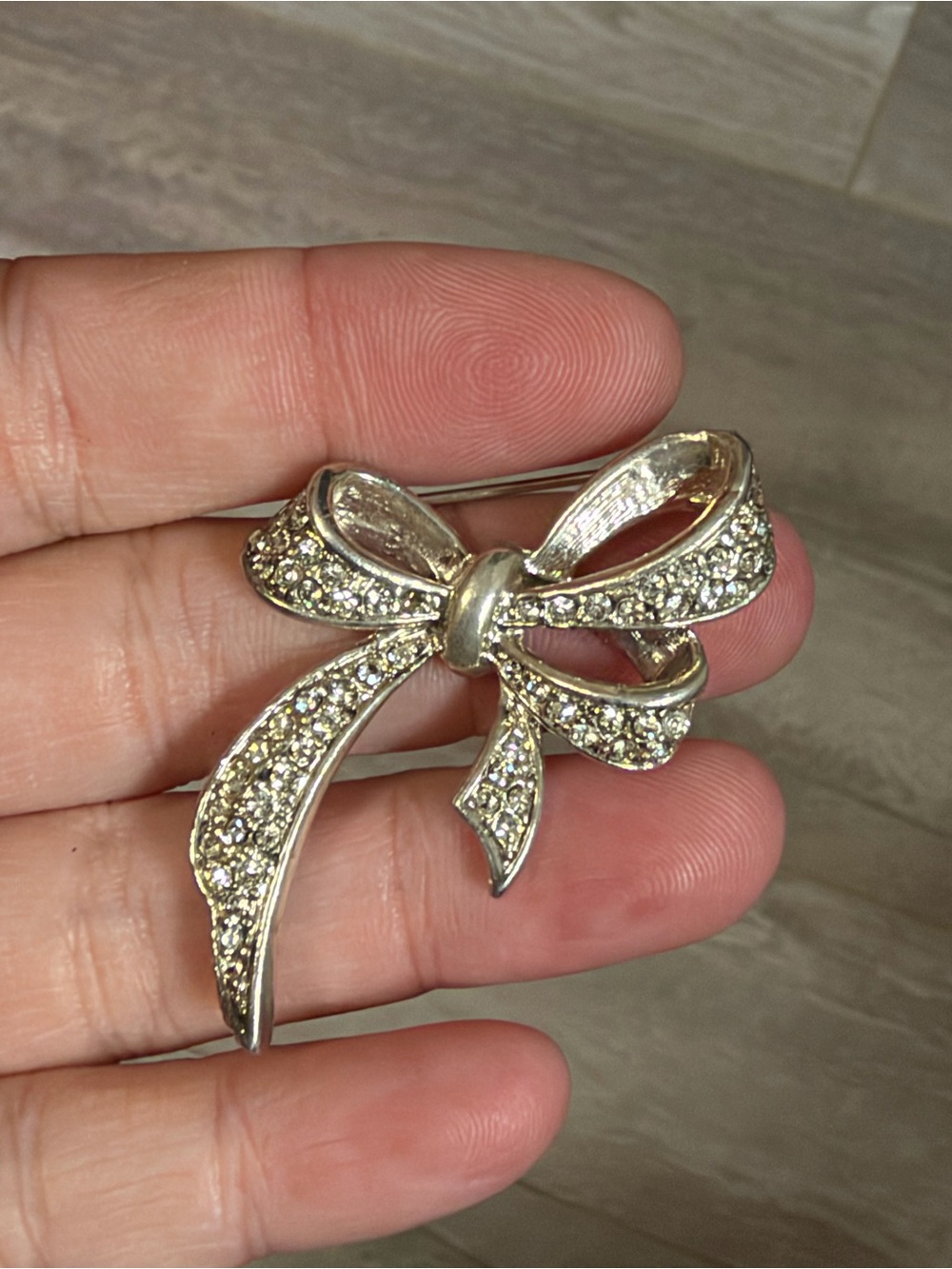 4/$100 Rhinestone Bow Brooch - Silver Crystal Accent